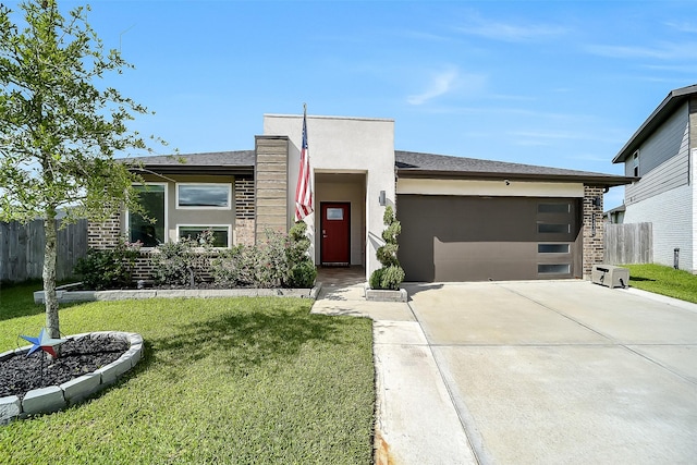 3330 Dagostino Creek Dr, Katy, TX 77494 - view of front of house featuring a garage, concrete driveway, and stucco siding