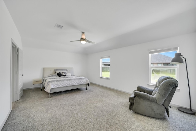 3330 Dagostino Creek Dr, Katy, TX 77494 - carpeted bedroom featuring multiple windows and a ceiling fan