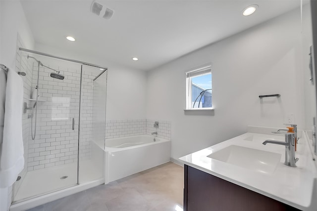 3330 Dagostino Creek Dr, Katy, TX 77494 - full bathroom with a bath, a shower stall, recessed lighting, double vanity, and tile patterned flooring