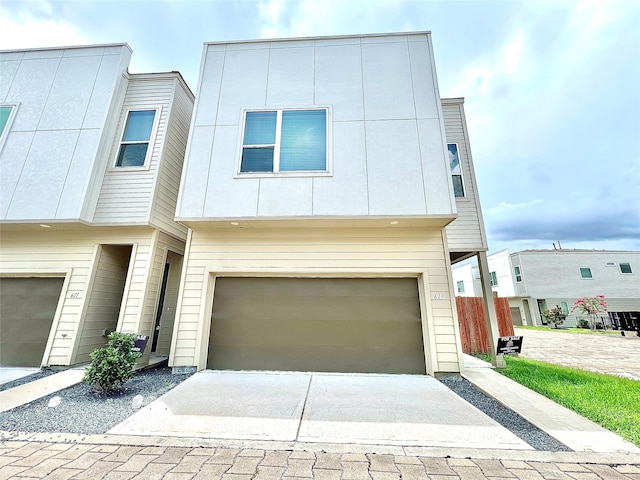 613 Thornton Oaks Ln, Houston, TX 77018 - modern home with an attached garage and driveway