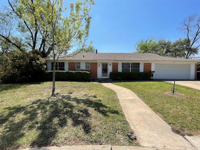 1703 Larkwood Ct, Austin, TX 78723 - single story home with brick siding, concrete driveway, a front yard, and an attached garage