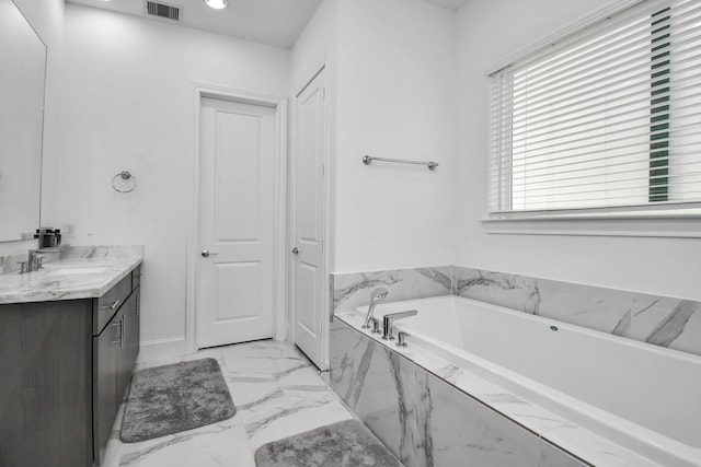 3302 Timbergrove Heights St, Houston, TX 77008 - bathroom with vanity, a bath, marble finish flooring, and recessed lighting