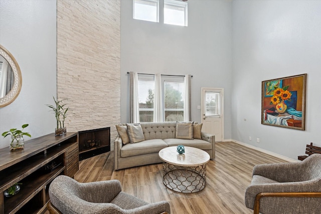 20838 Morgan Knoll Ln, Katy, TX 77449 - living area with a high ceiling and light wood-style floors