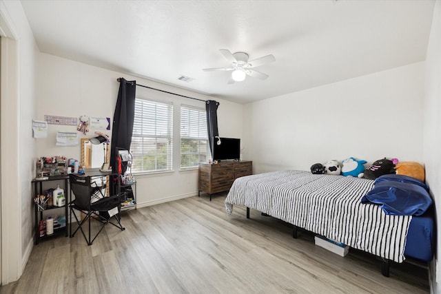 20838 Morgan Knoll Ln, Katy, TX 77449 - bedroom with wood finished floors and a ceiling fan