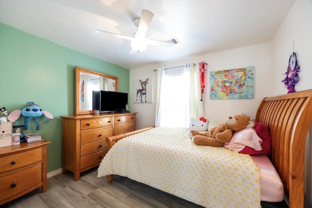 20838 Morgan Knoll Ln, Katy, TX 77449 - bedroom with light wood-style floors and a ceiling fan