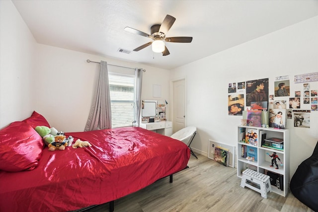 20838 Morgan Knoll Ln, Katy, TX 77449 - bedroom with wood finished floors and ceiling fan