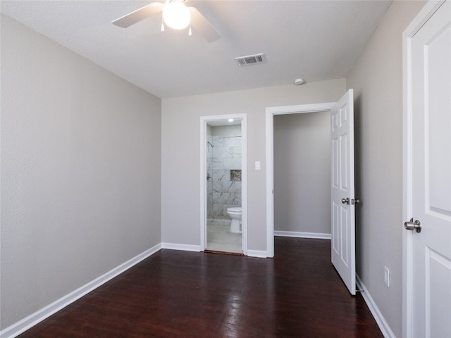 3215 Soway St, Houston, TX 77080 - unfurnished bedroom with wood finished floors, ensuite bath, and ceiling fan