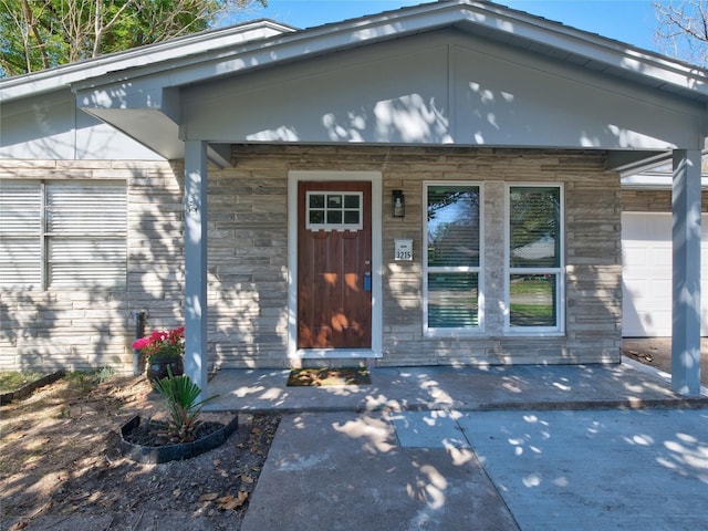 3215 Soway St, Houston, TX 77080 - entrance to property featuring stone siding and a porch