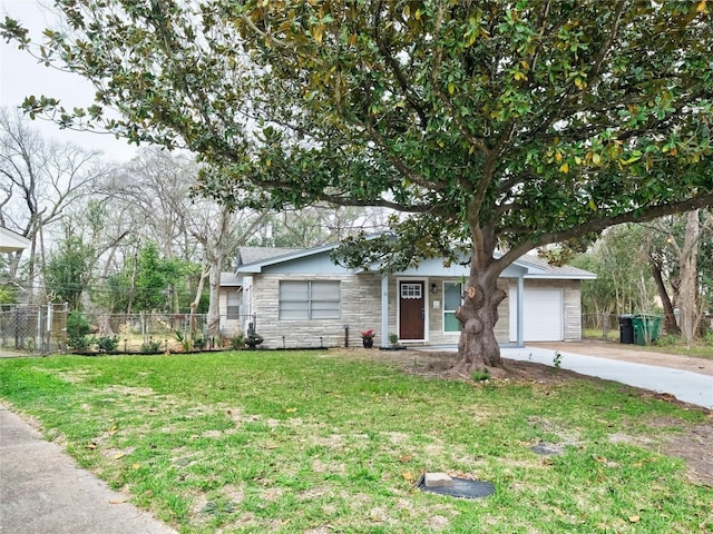 3215 Soway St, Houston, TX 77080 - view of front of property with stone siding, concrete driveway, and a garage