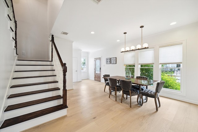 1101 Tabor St, Houston, TX 77009 - dining area with stairs, light wood finished floors, and recessed lighting