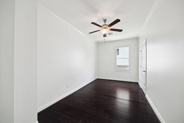 1101 Tabor St, Houston, TX 77009 - spare room featuring ornamental molding, dark wood finished floors, and ceiling fan