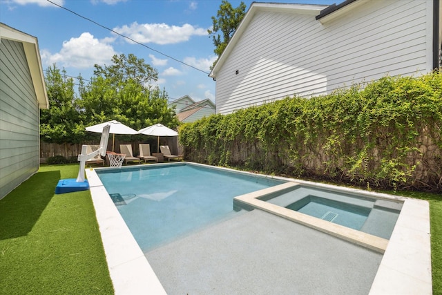1101 Tabor St, Houston, TX 77009 - view of swimming pool with a fenced backyard, a pool with connected hot tub, and a patio area