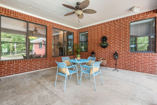32210 Mink Creek Ct, Magnolia, TX 77355 - view of patio / terrace with a ceiling fan and outdoor dining area