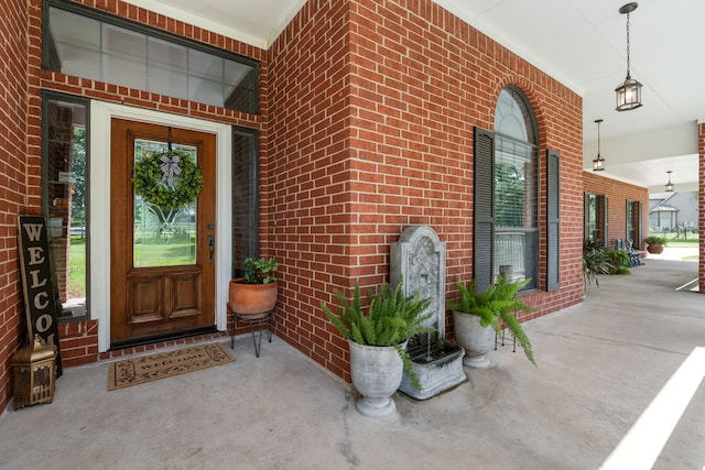 32210 Mink Creek Ct, Magnolia, TX 77355 - entrance to property with a porch and brick siding