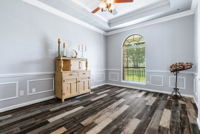 32210 Mink Creek Ct, Magnolia, TX 77355 - unfurnished room featuring a raised ceiling, dark wood-style floors, a ceiling fan, a decorative wall, and crown molding