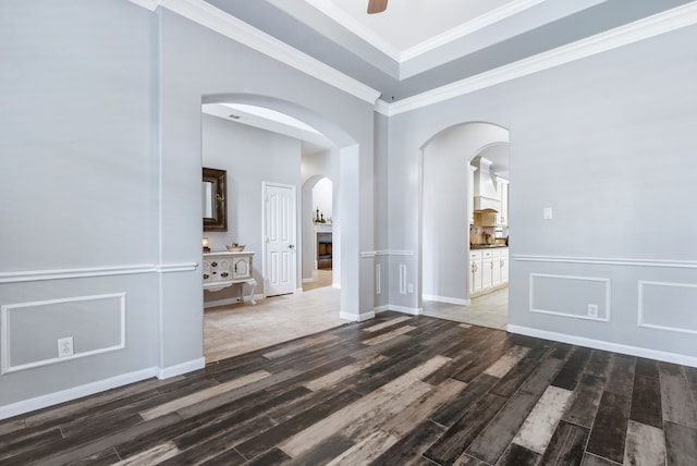 32210 Mink Creek Ct, Magnolia, TX 77355 - spare room with arched walkways, wood finished floors, crown molding, and a ceiling fan