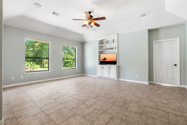 32210 Mink Creek Ct, Magnolia, TX 77355 - unfurnished living room with ceiling fan, vaulted ceiling, light tile patterned floors, and built in features