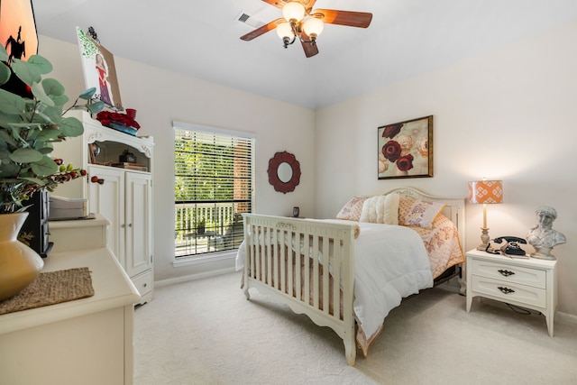 32210 Mink Creek Ct, Magnolia, TX 77355 - bedroom with light colored carpet and ceiling fan