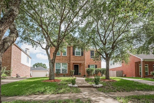 14212 Rocky Briar Ln, Rosharon, TX 77583 - view of front of home with brick siding and a garage
