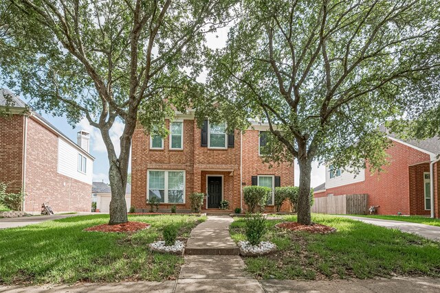 14212 Rocky Briar Ln, Rosharon, TX 77583 - view of front of home with brick siding