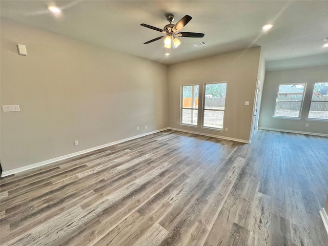 5 Seminole Ct, West Columbia, TX 77486 - unfurnished room featuring wood finished floors, ceiling fan, and recessed lighting