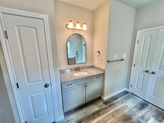 5 Seminole Ct, West Columbia, TX 77486 - bathroom featuring vanity and wood finished floors