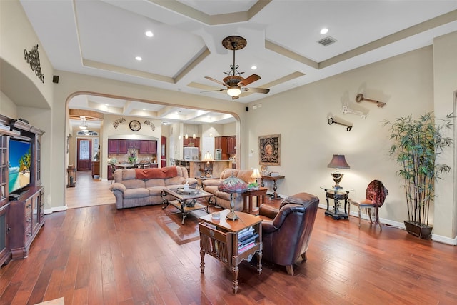 5702 Silverthorn Glen Dr, Spring, TX 77379 - living area featuring arched walkways, coffered ceiling, ceiling fan, dark wood-style floors, and recessed lighting