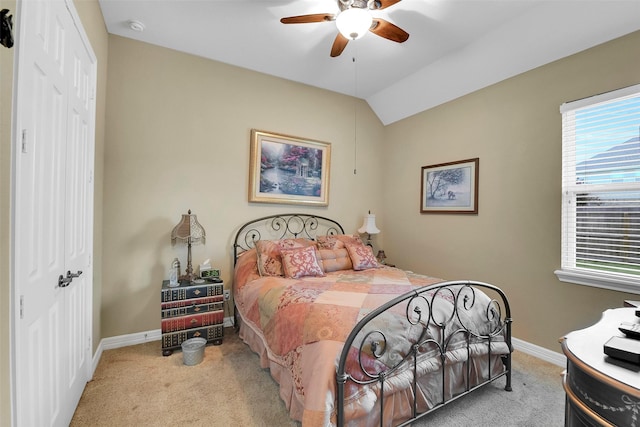 5702 Silverthorn Glen Dr, Spring, TX 77379 - bedroom featuring light carpet, a closet, lofted ceiling, and ceiling fan
