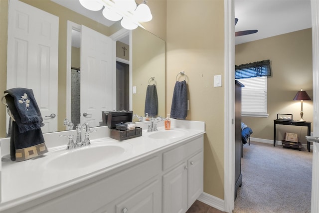 5702 Silverthorn Glen Dr, Spring, TX 77379 - full bath with double vanity and a chandelier