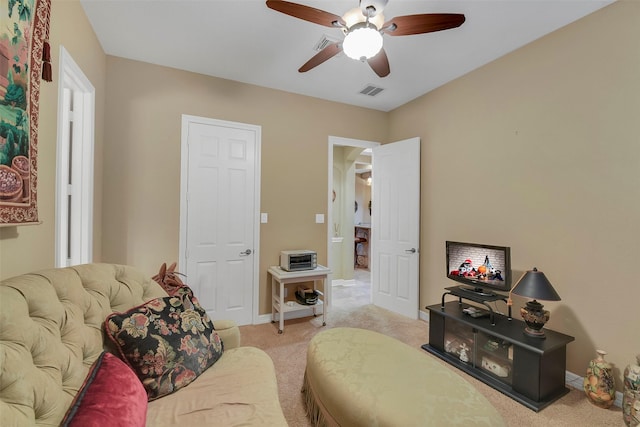 5702 Silverthorn Glen Dr, Spring, TX 77379 - carpeted living room featuring ceiling fan and baseboards