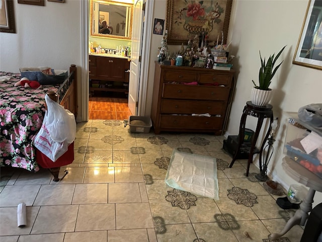 1506 Cordell St, Houston, TX 77009 - bedroom with ensuite bath and light tile patterned floors