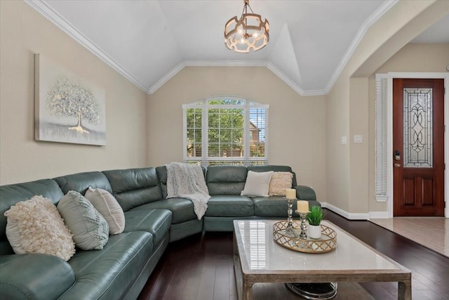 18135 Berry Garden Ln, Spring, TX 77379 - living room featuring dark wood-style floors, a chandelier, vaulted ceiling, and ornamental molding