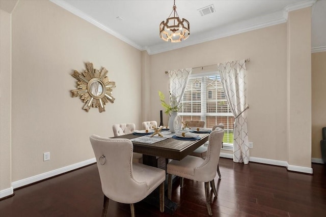 18135 Berry Garden Ln, Spring, TX 77379 - dining space with wood finished floors, crown molding, and a chandelier