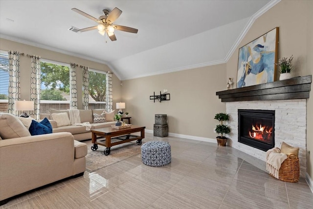 18135 Berry Garden Ln, Spring, TX 77379 - living room with lofted ceiling, a ceiling fan, a fireplace, and ornamental molding