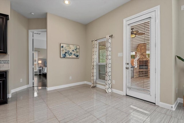 18135 Berry Garden Ln, Spring, TX 77379 - entryway with light tile patterned floors and recessed lighting
