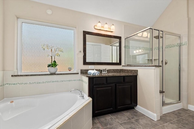 18135 Berry Garden Ln, Spring, TX 77379 - full bathroom with a garden tub, vanity, a stall shower, and tile patterned floors