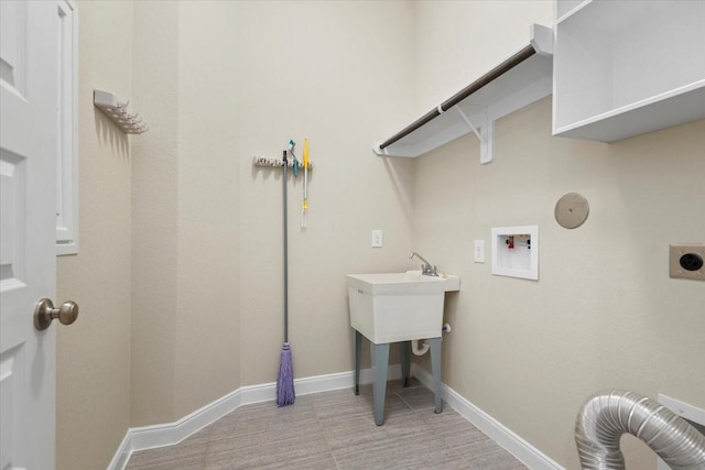 18135 Berry Garden Ln, Spring, TX 77379 - laundry area with electric dryer hookup and hookup for a washing machine