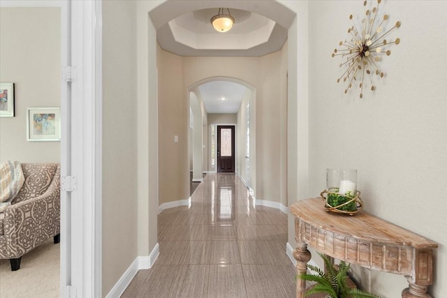 18135 Berry Garden Ln, Spring, TX 77379 - hallway with arched walkways and baseboards