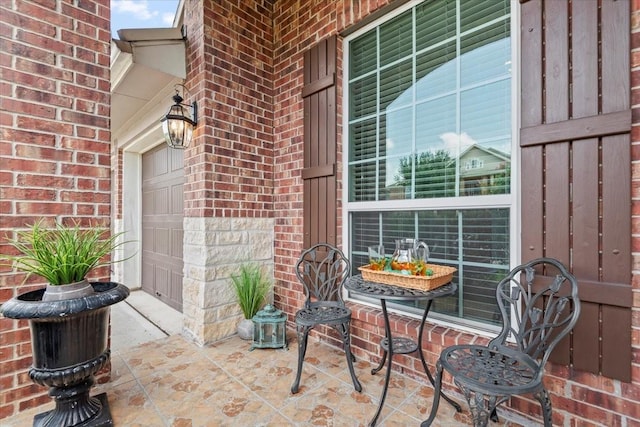18135 Berry Garden Ln, Spring, TX 77379 - view of patio featuring a garage