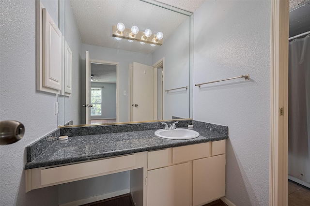 3100 Jeanetta St Unit 1104, Houston, TX 77063 - bathroom with vanity and a textured wall