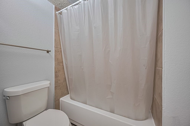 3100 Jeanetta St Unit 1104, Houston, TX 77063 - bathroom featuring shower / tub combo and a textured wall