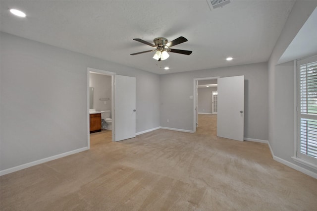 15815 Baytree Dr, Houston, TX 77070 - spare room featuring ceiling fan, light colored carpet, plenty of natural light, and recessed lighting