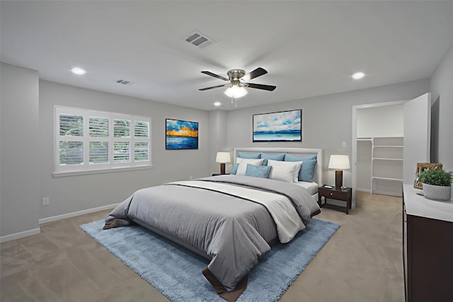 15815 Baytree Dr, Houston, TX 77070 - bedroom featuring light carpet, a ceiling fan, recessed lighting, and a walk in closet