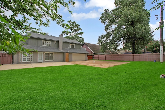 15815 Baytree Dr, Houston, TX 77070 - rear view of house with a patio area and a chimney