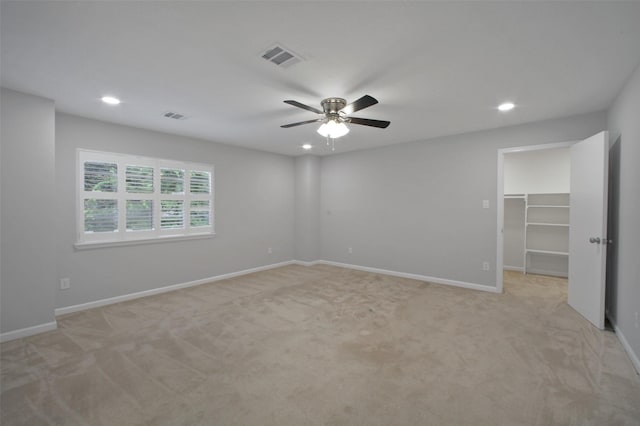 15815 Baytree Dr, Houston, TX 77070 - unfurnished bedroom with light colored carpet, a walk in closet, recessed lighting, and ceiling fan