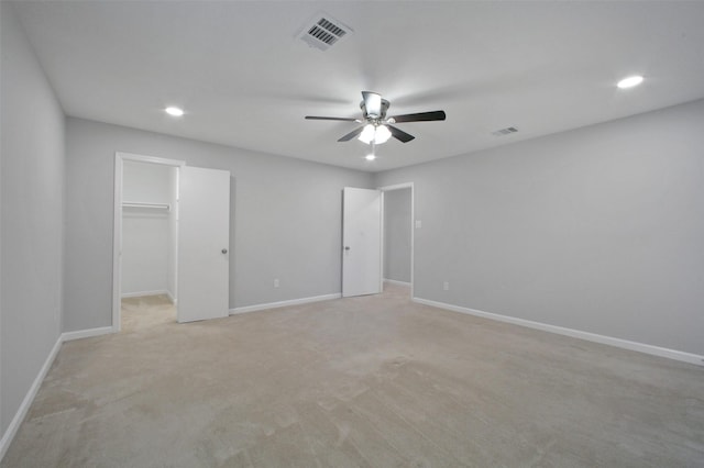 15815 Baytree Dr, Houston, TX 77070 - unfurnished bedroom featuring recessed lighting, a spacious closet, light colored carpet, and a ceiling fan