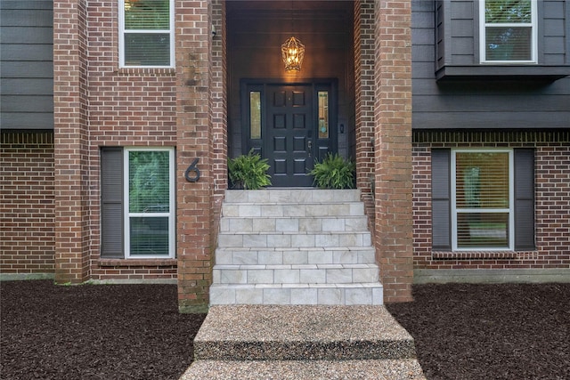 6 Sylvan Forest Dr, The Woodlands, TX 77381 - property entrance featuring brick siding