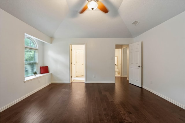 6 Sylvan Forest Dr, The Woodlands, TX 77381 - unfurnished bedroom with vaulted ceiling, hardwood / wood-style flooring, and a ceiling fan