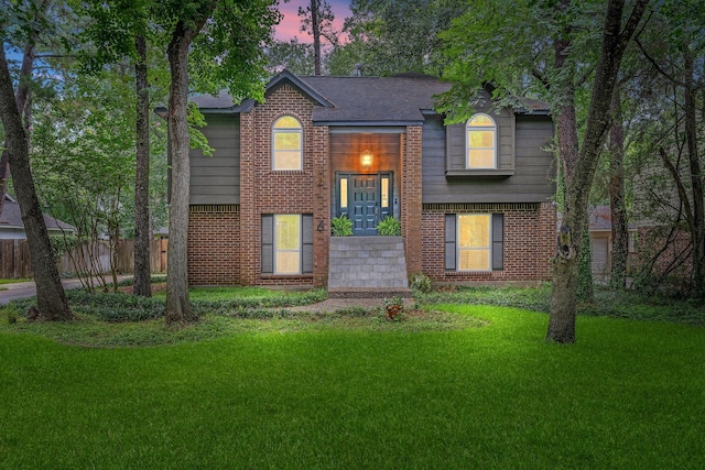 6 Sylvan Forest Dr, The Woodlands, TX 77381 - split foyer home featuring brick siding
