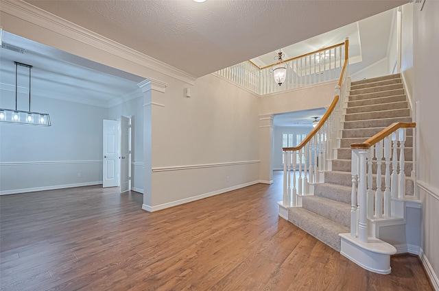 1902 Rosebay Ct, Sugar Land, TX 77479 - stairs featuring crown molding and wood finished floors